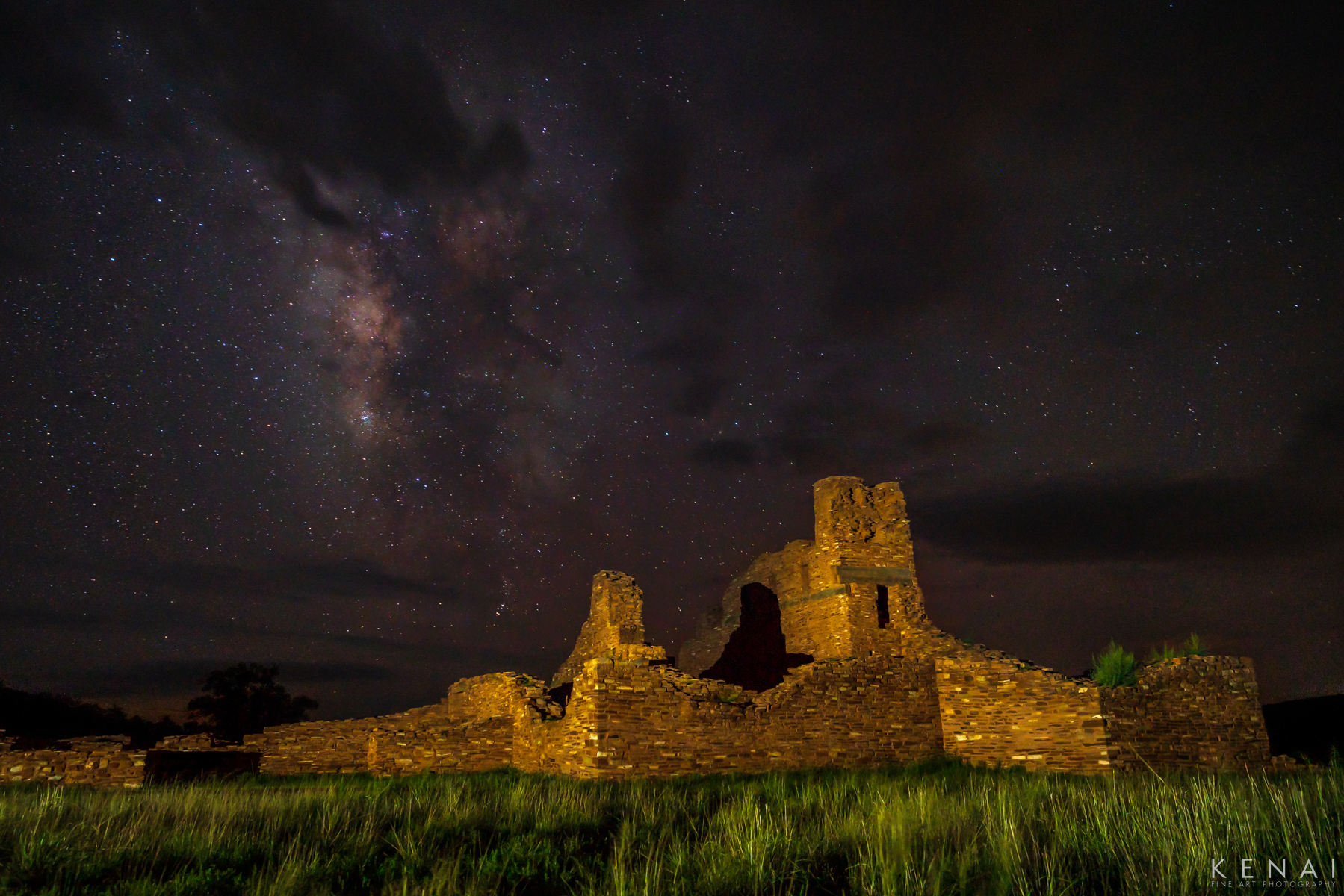 The Abo Salt Mission Ruins appear beneath the milky way in this night photo.