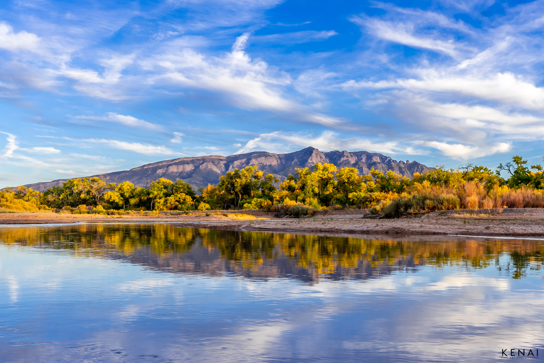 A brilliant, sun-filled day over the Rio Grande Bosque and Sandia Mountains of New Mexico.